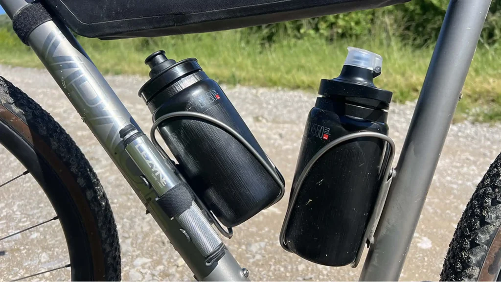 Two cycling bottles mounted on a gravel bike, including a Katadyn BeFree filter bottle.